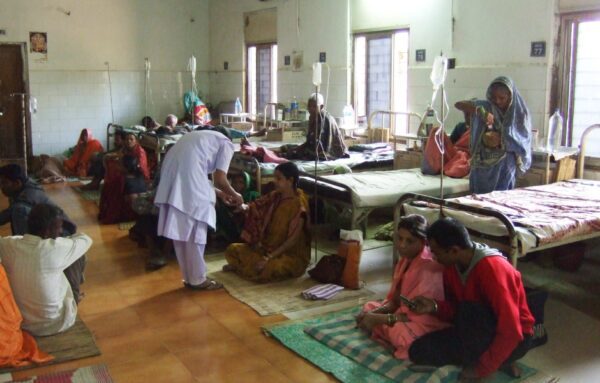 A group of people sitting in a room.