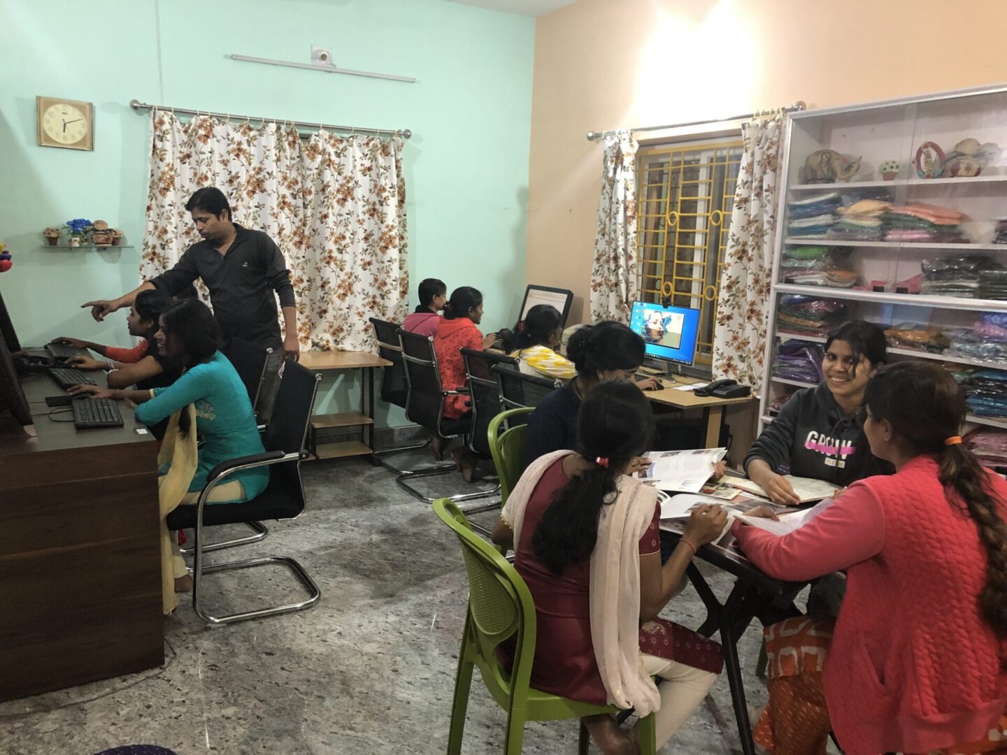 A group of people sitting around in a room.